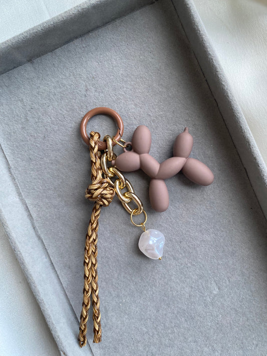 Brown dog with pearl