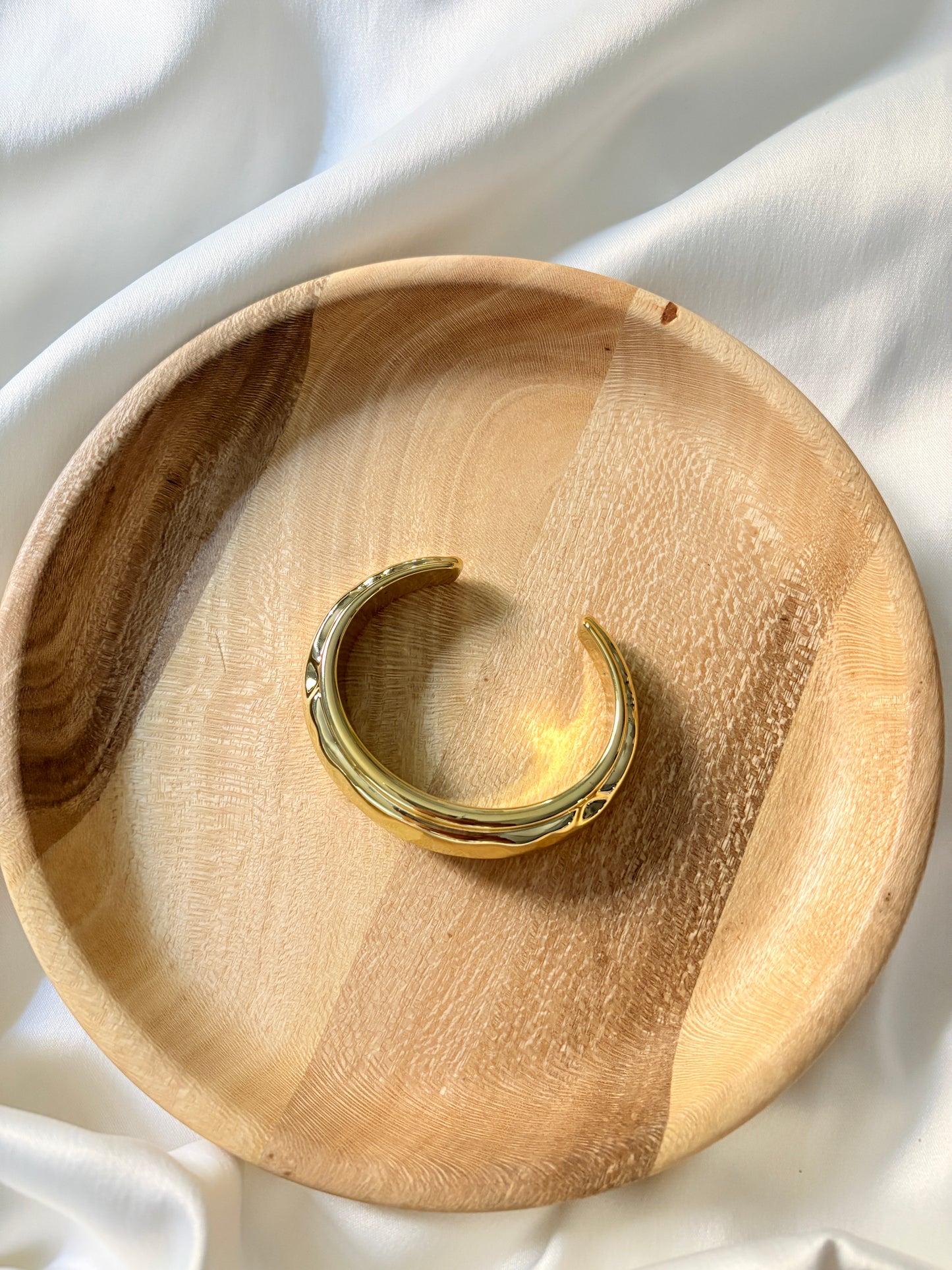 Gold statement bangle